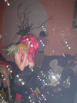 legs akimbo eating a pineapple @ deep